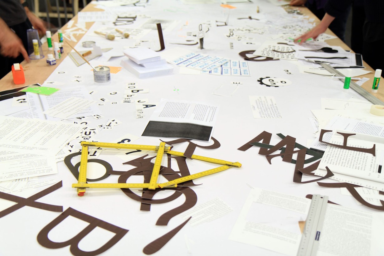 Workshop with Andrea Maurer: cut outs of letters on a table