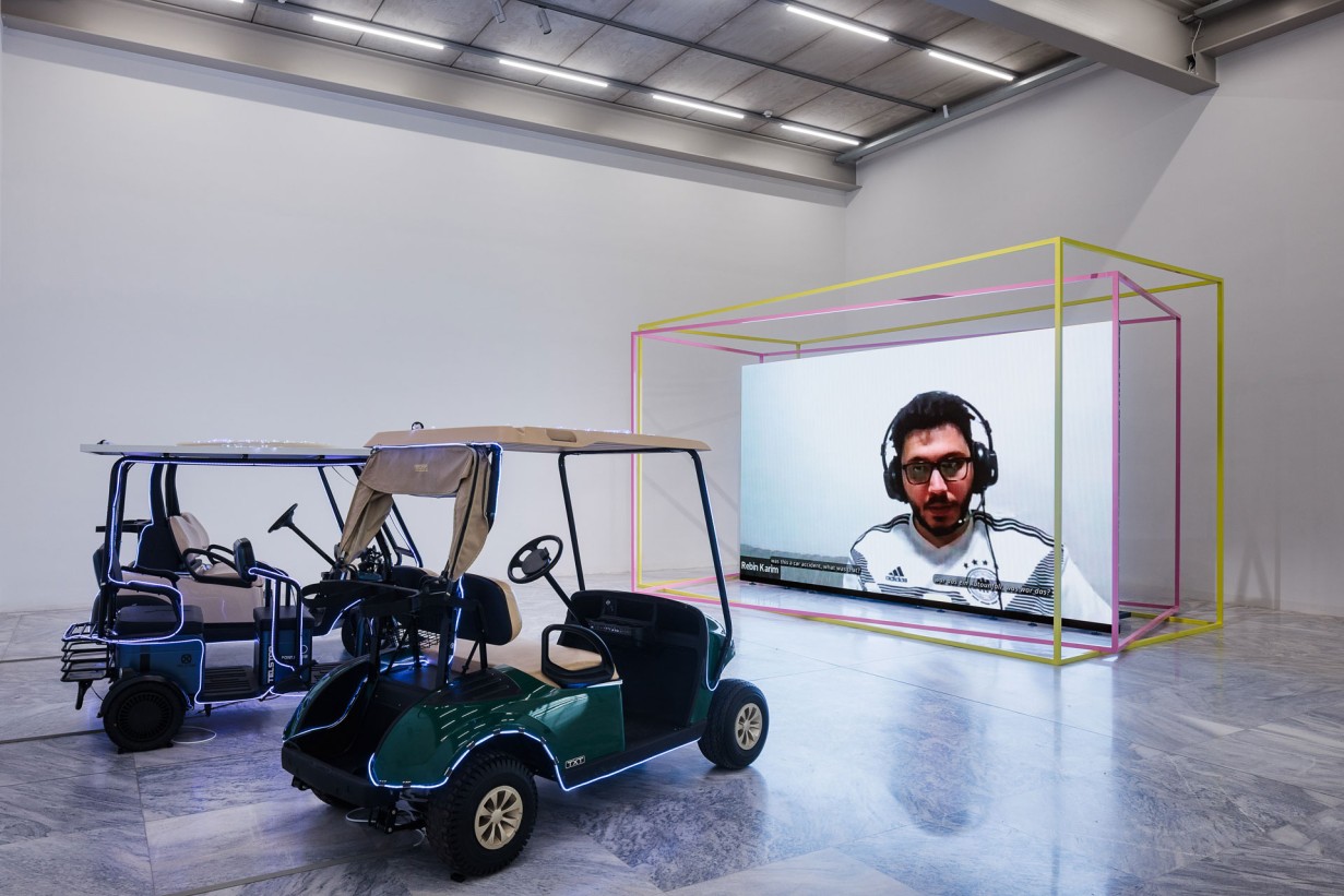 Exhibition room golf carts with screen of the Mechanical Kurds shows