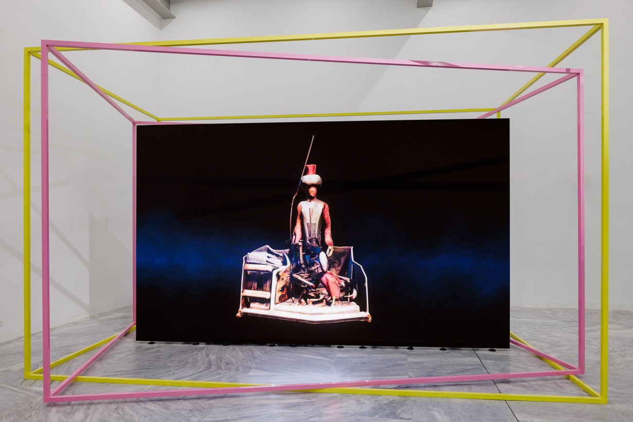 Exhibition room with screen of the Mechanical Kurds shows